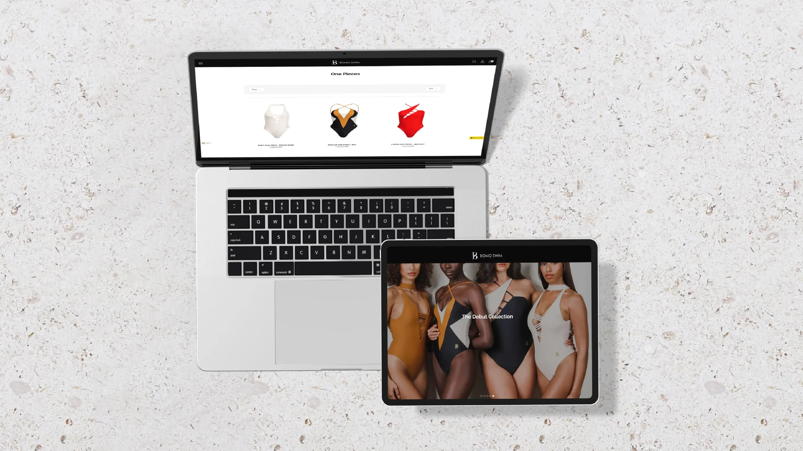A laptop with a woman's swimsuit on it.