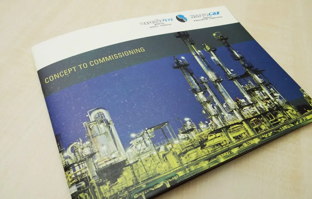 A brochure with a picture of an oil refinery.