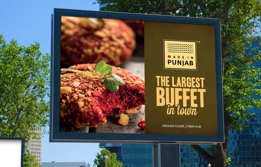 A billboard advertising the largest buffet at good.