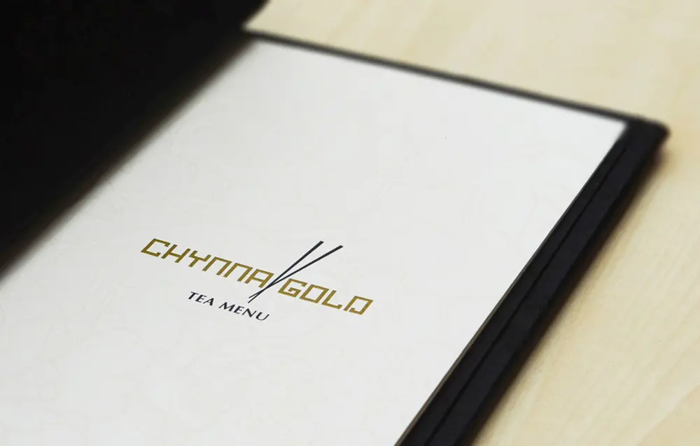 A notebook with the name cyming gold on it.