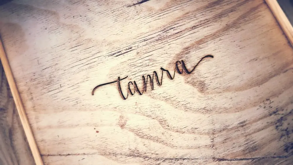 A wooden box with the word tamana written on it.