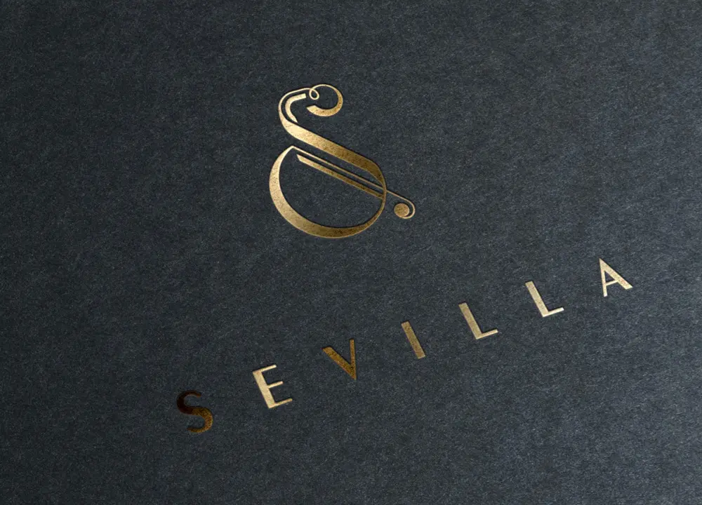 A gold logo for sevila.